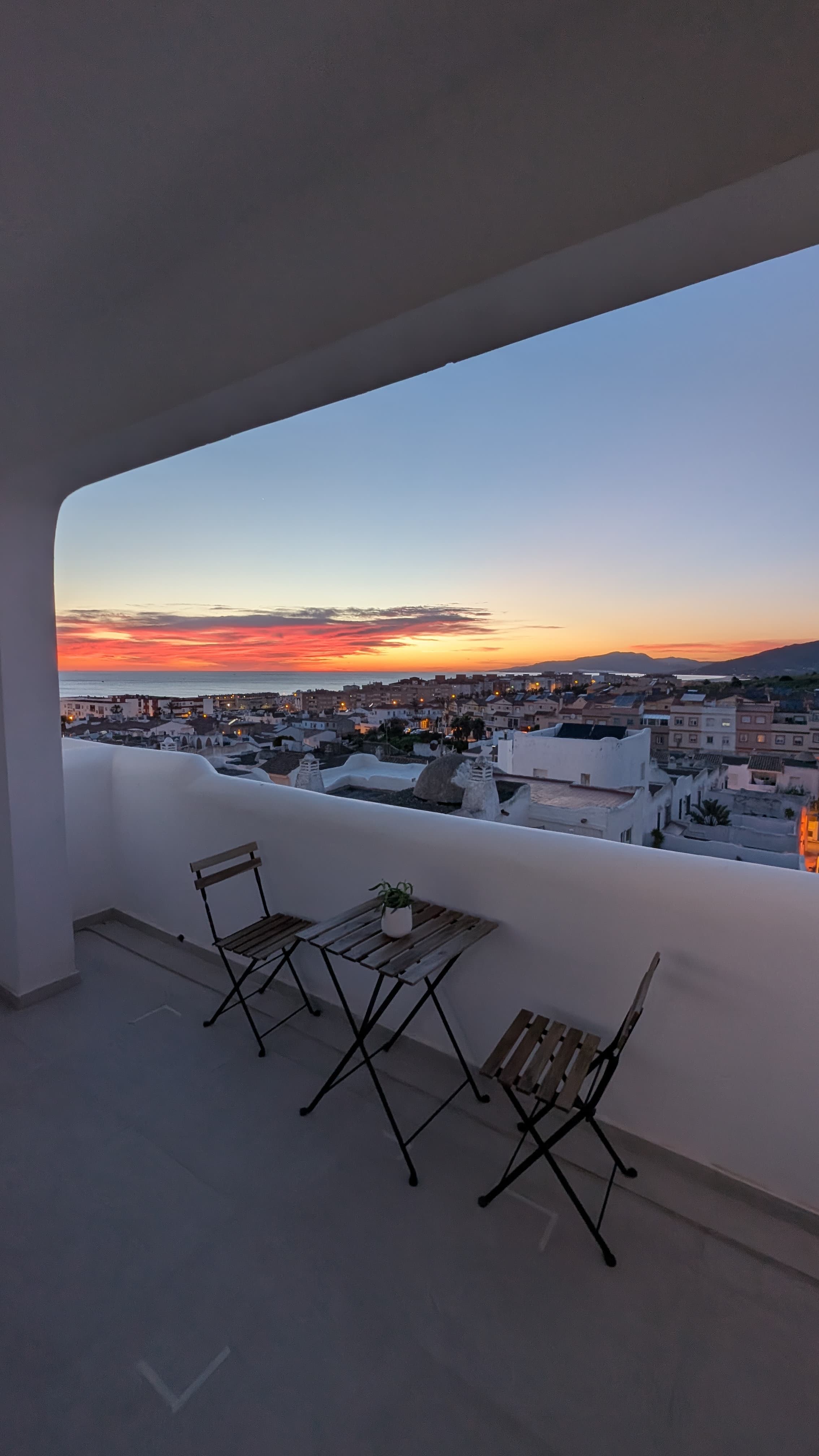 Tarifa at night with city lights below